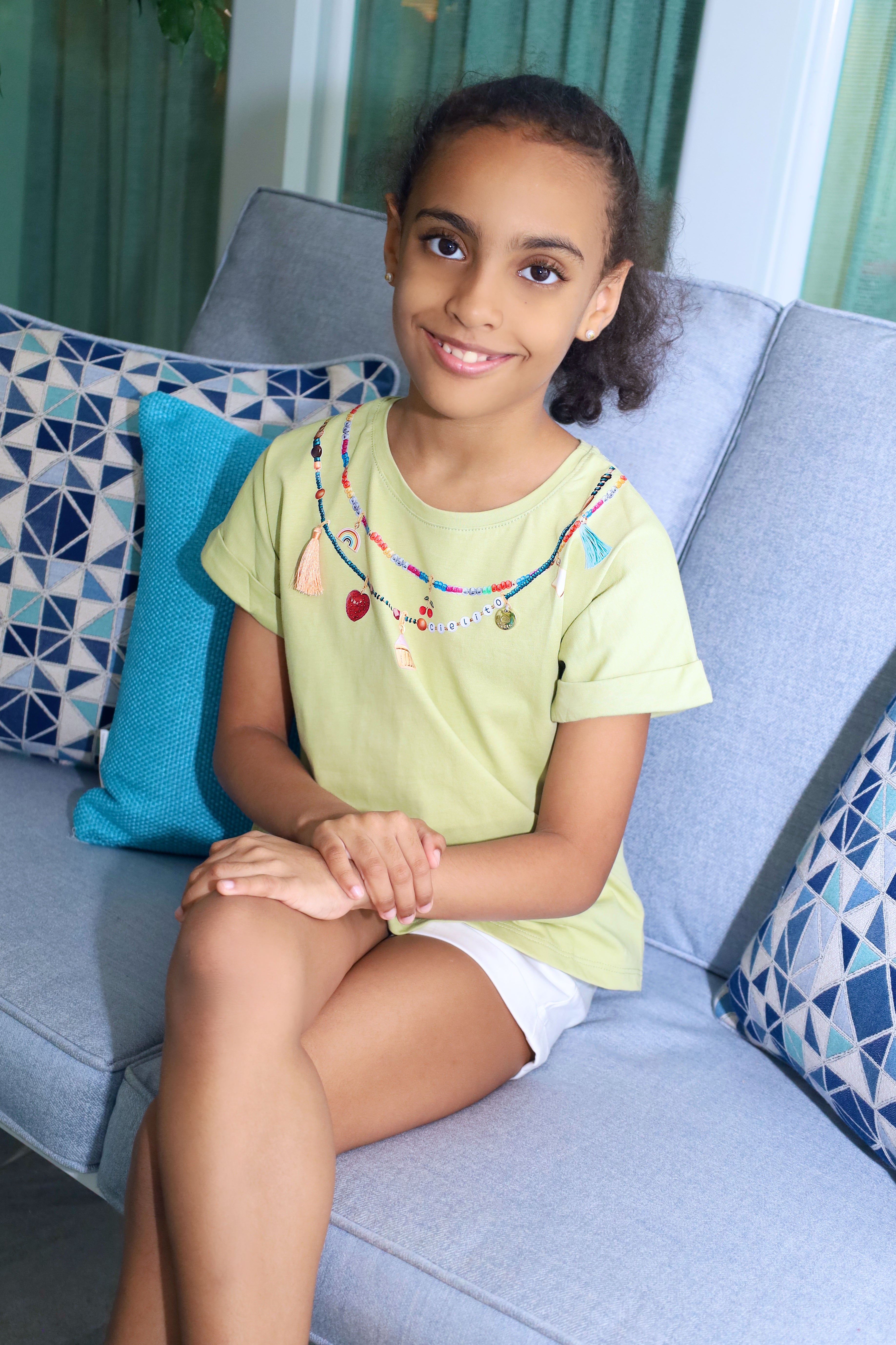 Green T-Shirt with Colorful Necklace Print & White Shorts Set for Girls